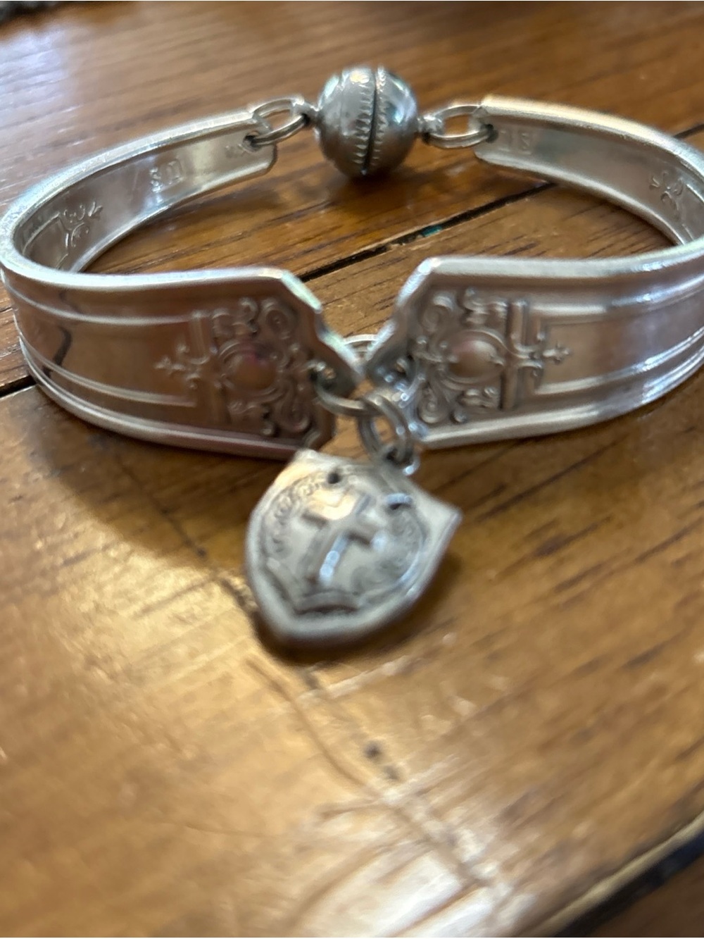Artisan Silver Spoon Bracelet with Shield Charm